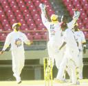 The Windward Islands players are ecstatic as Sewnarine Chattergoon goes for 98. (Aubrey Crawford photo)