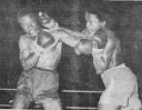 FLASHBACK! Mark Harris, right, scores with a right to the head of Vernon Lewis during their 15-round welterweight championship fight at the National Park in 1979. Lewis won on a split decision.