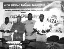 From left Troy Peters (Communications Manager Banks DIH); President of the Guyana National Dominoes Federation (GNDF) Robert Williams; Organizing Secretary GNDF Wendell Mc Pherson; and Dwain Bristol (Liquor Sales Manager Banks DIH) pose with samples of Kazak Vodka and Kazak dominoes at the launching yesterday. (Lawrence Fanfair photo)