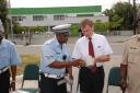 Deputy British High Commissioner Malcolm Kirk (left) hands over the radar guns to Acting Commissioner of Police Henry Greene. (Photo by Jules Gibson)