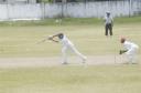 Essequibo’s captain Royan Fredericks drives off the front foot during his innings of 83 against Berbice in the Guyana Cricket Board (GCB) GTM sponsored under -19 limited overs Inter County match at the DCC ground yesterday. (Aubrey Crawford photo)