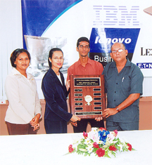 Best graduating University of Guyana Computer Science student Ken Singh (second from right) poses with (from left to right) Executive Assistant  Bibi Narine, operations manager Yashwantie Ramudit-Doobay and University of Guyana Deputy Vice-Chancellor Tota Mangar.