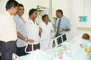 Visiting kidney patient, Ishmael Ibrahim: Minister of Health Dr Leslie Ramsammy speaking to a nurse in the ICU and Dr Rambarran Ramsackal as (from left) Dr David Armogan and Dr Vishwa Mahadeo look on. (Photo by Shabna Ullah)