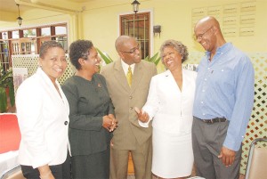 Taking a break from the parliament and media seminar yesterday at Grand Coastal Inn are from left Judith Hall Bean of Bermuda, PNCR-1G MP Deborah Backer, Trinidad and Tobago Minister of Information Neil Parsanal, Dame Jennifer Smith of Bermuda and PNCR-1G MP Lance Carberry. (Photo by Jules Gibson)