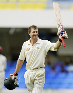 Simon Katich, above, celebrates his third test century after being put down when on 91 by Runako Morton off Fidel Edwards. (Cricinfo photo)