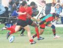 Touch Down!!! Guyana’s Tricia Munroe scores her team’s only try against Trinidad and Tobago when the two teams met in the second round of the Demlife/Tropical Rhythm North American West Indies Rugby Association (NAWIRA) women’s 15-a-side Rugby tournament at the National Park yesterday.(Lawrence Fanfair photo)