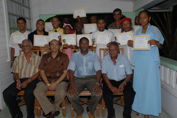 (From right) Coordinator of the Sports for Life Programme and GVF President Lennox Shuffler, President of the GOA K.A Juman Yassin, GCF President Hector Edwards and GCF Racing Secretary Hassan Mohammed seated in front of the many awardees at the Olympic House last Saturday for the GCF and GOA appreciation evening and award ceremony.     