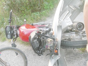 The bike with the bumper from the police vehicle