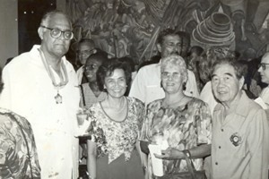 From left: The late Martin Carter, Doreen Chung, Phyllis Carter and Arthur Chung at a National Awards ceremony. (Stabroek News file photo) 