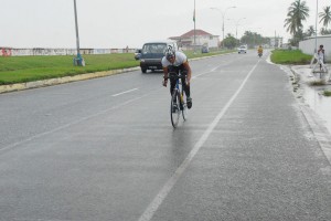 Christopher Persaud is caught here by Stabroek Sport photographer Clairmonte Marcus making the drive for home yesterday during the time trial organized by the Guyana Cycling Federation.  