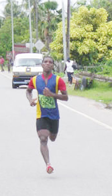 Kelvin Johnson powers to victory in the final segment of the 2008 Ministry of Culture, Youth and Sport’s Triathlon.