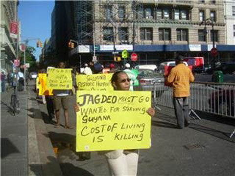 One of the picketers in New York  (Photo courtesy PNCR)