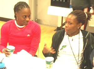 Cordial Competitors! Guyana\'s Aliann Pompey (r) and fellow 400m runner Kaltouma Nadjina of Chad having a little chat before the competition in Ireland.