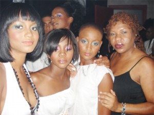 Paulla with models she made up at White Angels in Grenada.