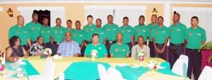 President of the Guyana Cricket Board Chetram Singh, third right sitting, and TCL’s managing director (Guyana) Mark Bender, third left, along with the members of the Guyana Under-19 team at  the dinner held for the team at the Waterchris Hotel on Tuesday evening. (Lawrence Fanfair photo)