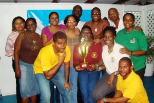 The victorious Bank of Guyana dominoes team.