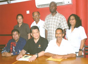  Proud member of the Guyana Japanese Karate Association; Standing (L-R) are Maureen Woon-A-Tai, Rev. Compton Meerabux, Professor Aubrey Mendonca and Nafeeza Rodrigues while sitting from left to right are Vice-Chairman Ian Fung, Frank Woon-A-Tai (Chairman) and Jeffry Wong (Vice Chairman). (Clairmonte Marcus photo)