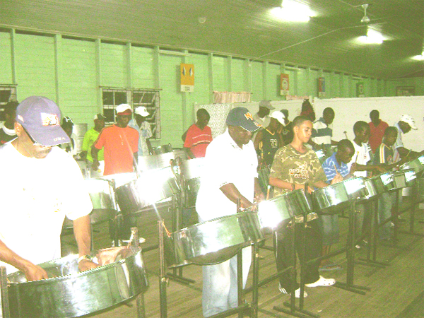 Members of the national steel orchestra rehearsing at the Carifesta Sports Complex