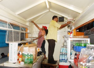 Getting all the corners! A stall being cleaned at the Stabroek Market on Wednesday.  