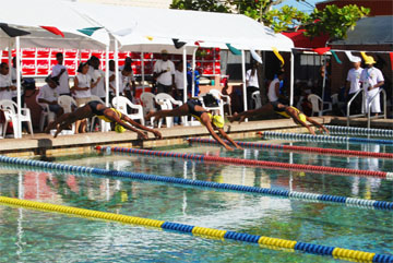 Three of Guyana’s junior age group swimmers, who incidentally were grouped in the same heat, gave their best efforts, yesterday at the Castellani Pool during the 2008 Goodwill Swimming Championships. (A Lawrence Fanfair photograph)