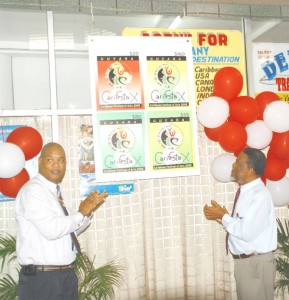 Prime Minister Samuel Hinds (right) and Bishop Juan Edghill were on hand yesterday when these four stamps were officially released as part of the Carifesta X celebrations. (Jules Gibson photo)
