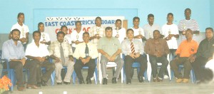President of the Guyana Cricket Board (GCB) Chetram Singh (centre) and president of the East Coast Cricket Board (ECCB) Bissoondial Singh (fourth from right), along with other executive members of the ECCB strike a pose with the special awardees of the ECCB seventh academy. (An Aubrey Crawford photo)