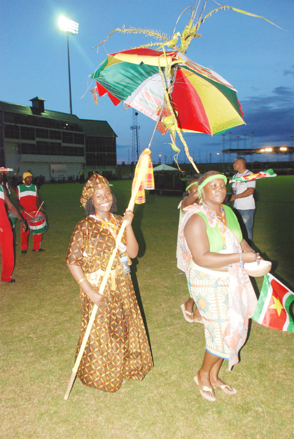 Surinamese marching under a unity theme