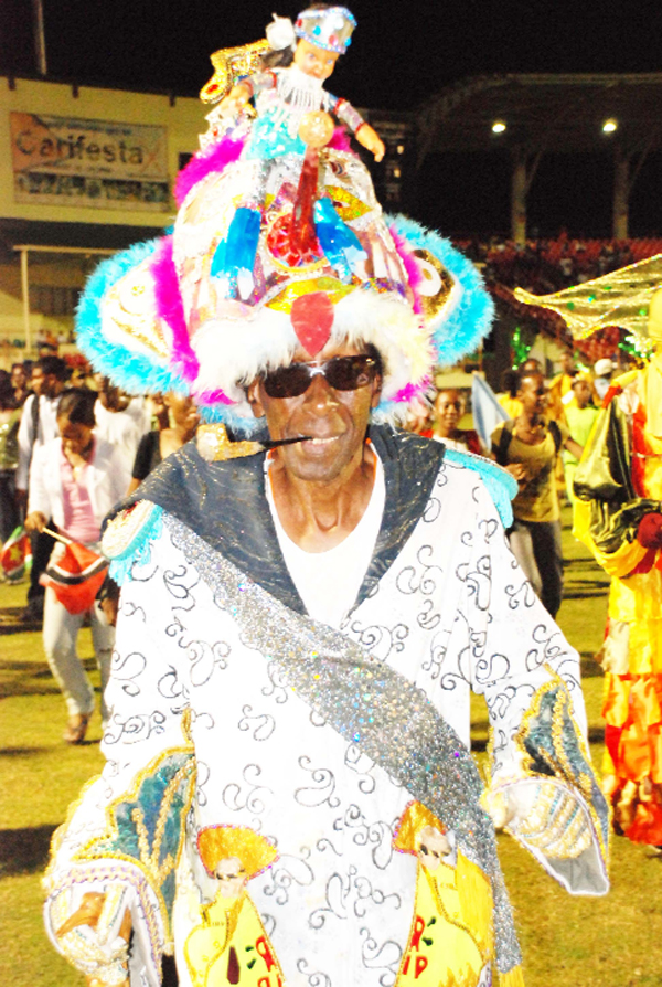 A veteran Trini reveler in his dazzling Carifesta costume!