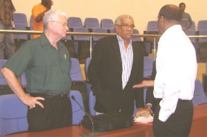 St Lucian Nobel laureate Derek Walcott speaking with President Bharrat Jagdeo at the end of yesterday’s symposium at the International Convention Centre. Looking on at left is poet and columnist, Ian McDonald. 