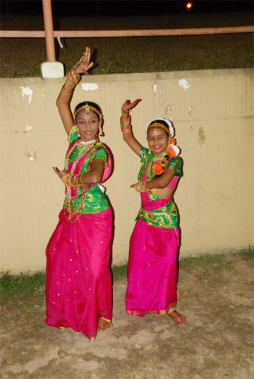 These dancers posed just before their performance at the Bhajan Deepanjali last night at the National Stadium, Providence.