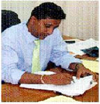 GTTA president Anil Nandlall, above, signs the three year deal with Stag.