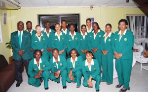 The Guyana women’s team (flanked by coach Michael Hayes and manager Maylene Ramdhular with captain Zaheeda Samdally, third from left stooping) which placed fifth in the eight-team regional competition. (Lawrence Fanfair photo)  