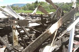 The charred remains of the Waramadong Secondary School female dormitory. (A GINA/P. Jaigopaul photo) 