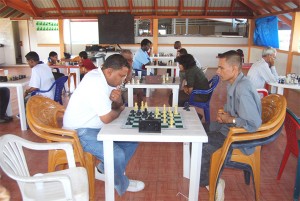 BATTLE OF THE PERSAUDS! National chess champion Kriskal Persaud, left, is deep in concentration during his match with Haatram Persaud. (Lawrence Fanfair photo)