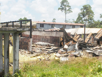 The destroyed buildings at the Roop Group compound at Land of Canaan.  