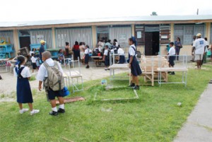 Classes in the school yard? This certainly appears to be the case. When the students of the Stella Maris Primary turned out for school yesterday that was the sight they were met with. (Jules Gibson photo). 
