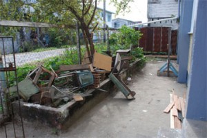 Damaged furniture discarded in part of the school’s compound.