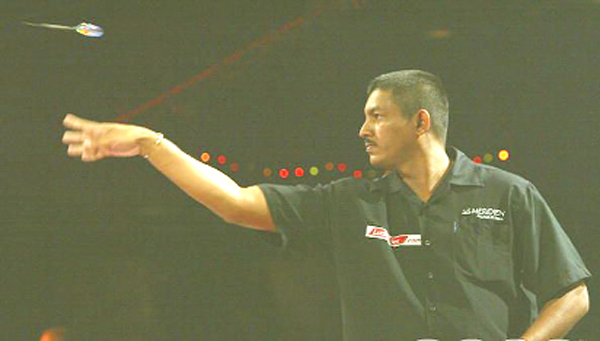 National men’s singles darts champion Norman Madhoo has his eyes on qualifying for the World Darts Championships.  