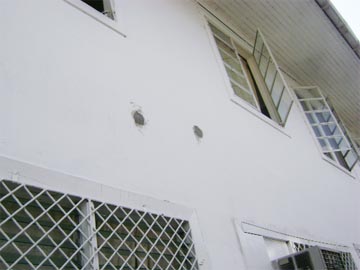 The bullet holes on the night of February 17 on the Banks DIH building were patched.   