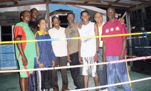 Georgetown Mayor Hamilton Green forth from left is flanked by (from left) National Coach Carl Franklyn, Terrence Poole, Herlando Allicock, Cleveland Rocke, Stefan Gouveia, GABA President Affeeze Khan and Akeem Alexander. 