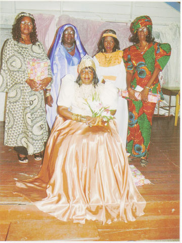  The Queen of Sheba, Shirley Lewis, seated on her throne. Standing from left to right are: first runner-up, Claudette Ralph, second runner-up, Pamela Hutson, third runner-up Claudia Harris and the fourth runner-up Patricia Mitchell. 