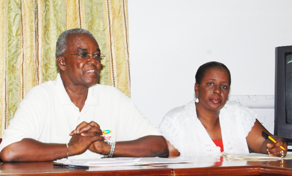 President of the Athletics Association of Guyana Claude Blackmore and Pamela Phillips at yesterday’s press conference. (Lawrence Fanfair photo)  