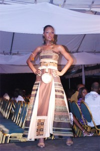 A model shows a gown by Trinidadian Rodney Alexander at the opening of Guyana Fashion Weekend 2 on Friday night.  (Photo by Jules Gibson)