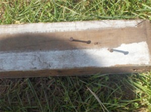 A piece of wood with exposed nails in the playing area at the school yesterday. 
