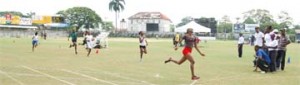  Brickdam’s Ianna Graham blows away her opponents in the U-16 200m yesterday at the GCC ground, Bourda in the North District Champion of Champions. (Lawrence Fanfair Photo) 