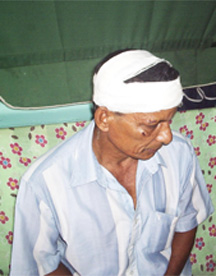 Chaitram, his head in bandages, after the beating he suffered at the hands of the bandits on Tuesday evening. 