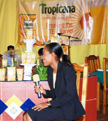 Alana Johnson, Marketing Executive of Demerara Distillers Limited (DDL) with some of the product.