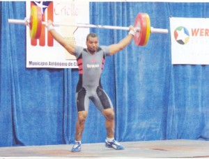 Guyanese Sean Cozier executing one of his lifts at the Criollo Cup Weightlifting Championships in Puerto Rico last Saturday. (Photo Courtesy GAWA)  