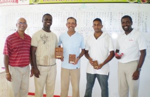 Trophy Stall golf tournament winner Gavin Todd, second from left poses with the other prize winners. On Todd’s left is second place finisher Ronald Bulkan while third place finisher Monnaf Singh is second from right. At right is Alfred Mentore who recorded the best gross in the competition while club captain Jerome Khan is at left.  