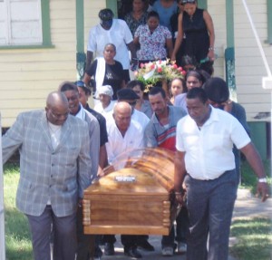 Relatives leaving the church on Wednesday with the remains of Sheila Gonsalves. 